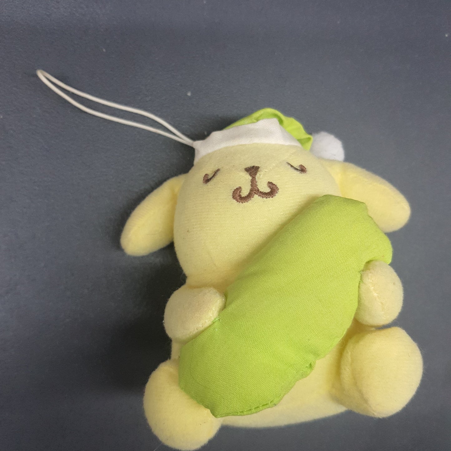 (K06) Sanrio Keychain ( Pompompurin Sleeping)